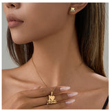 Collar y aretes Jesus Juego en Acero Inoxidable